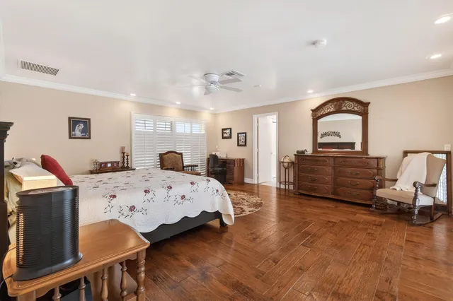 a bathroom with a sink a vanity and a mirror