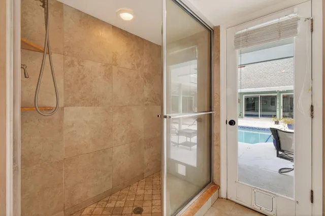 a bathroom with a granite countertop sink a toilet and a bathtub