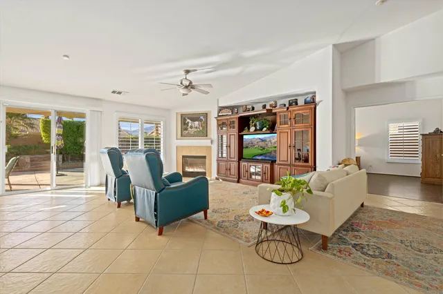 a living room with furniture and a table