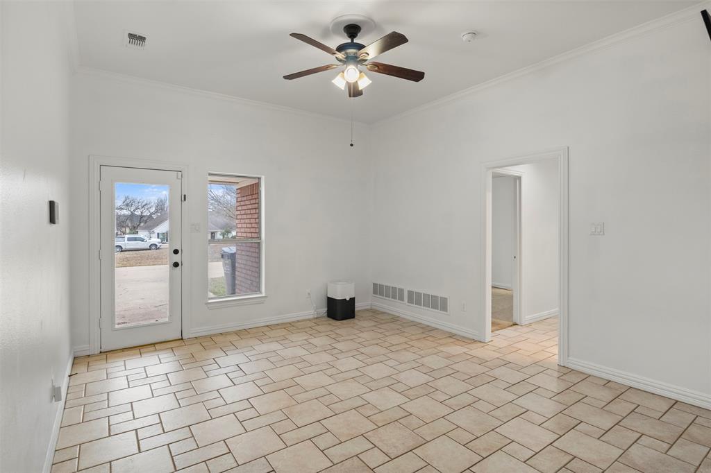 364 Preakness Place Road Van Alstyne, TX 75495 - Photo 22 of 40 wooden floor in an empty room with a window