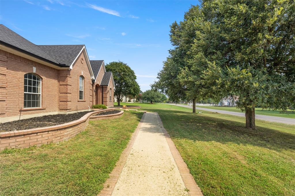 364 Preakness Place Road Van Alstyne, TX 75495 - Photo 37 of 40 a view of swimming pool with a yard