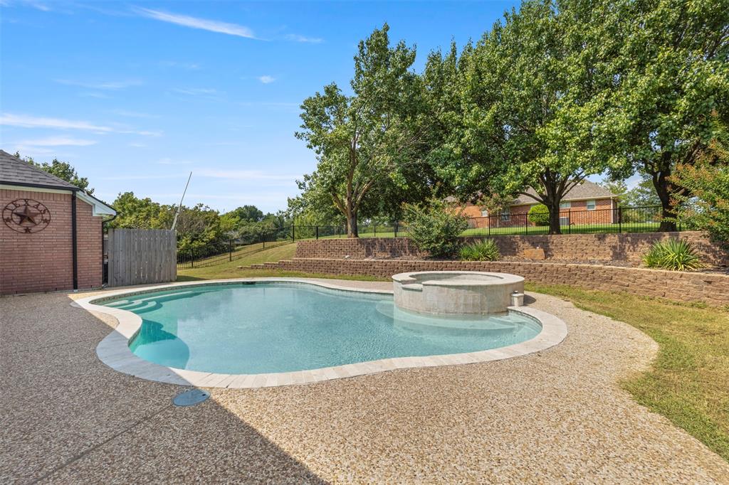 364 Preakness Place Road Van Alstyne, TX 75495 - Photo 39 of 40 a view of a swimming pool with a yard