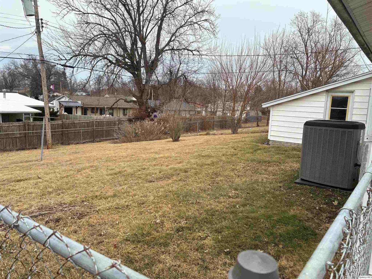 3409 Lawrence Road Quincy, IL 62301 - Photo 2 of 11 a view of back yard of the house