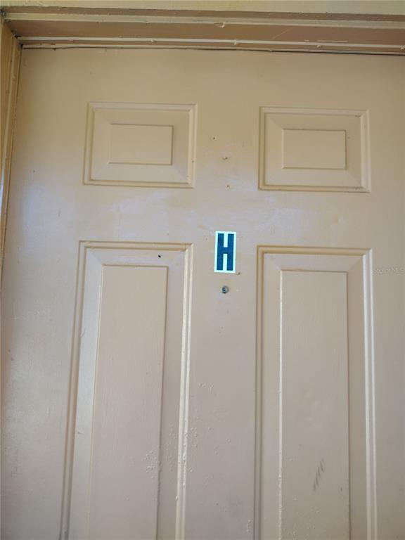 2192 Knox McRae Drive, Unit H Titusville, FL 32780 - Photo 2 of 6 a view of front door