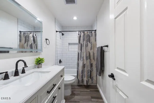 a bathroom with a sink and a shower