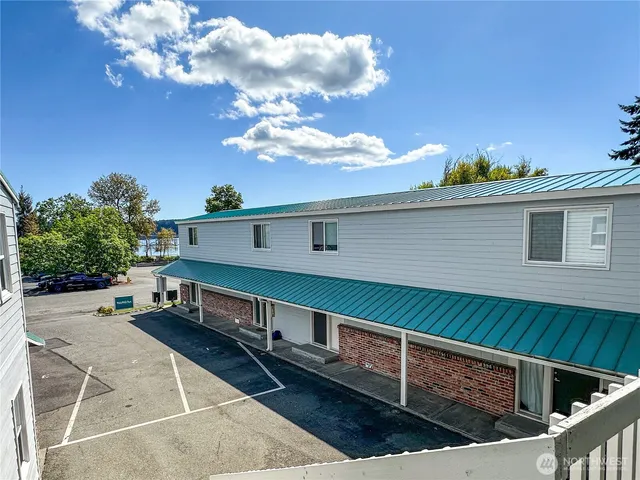 a view of a balcony with hardwood