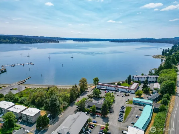 an aerial view of a houses with outdoor space