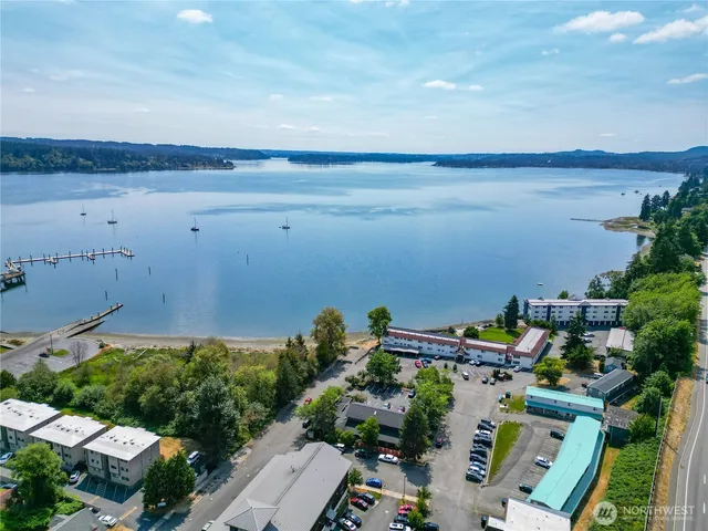 an aerial view of a houses with outdoor space