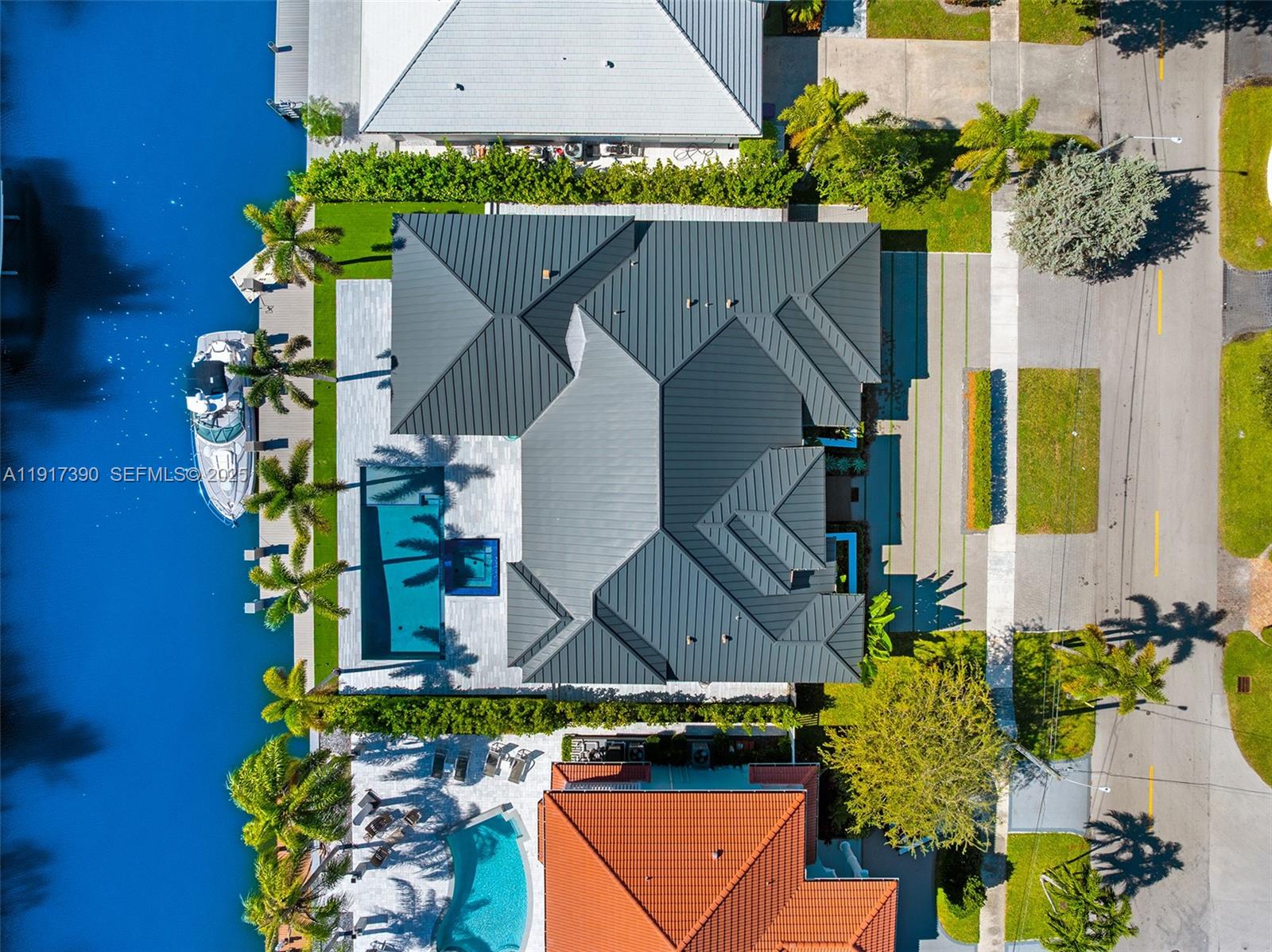900 Washington Street Hollywood, FL 33019 - Photo 56 of 61 an aerial view of a house with a garden