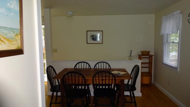 27 Hideaway Road, Unit G Buzzards Bay, MA 02532 - Photo 12 of 34 a view of a dining room with furniture