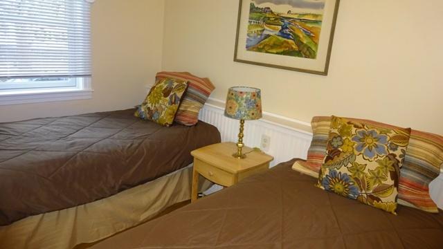27 Hideaway Road, Unit G Buzzards Bay, MA 02532 - Photo 17 of 34 a bedroom with a bed and a couch