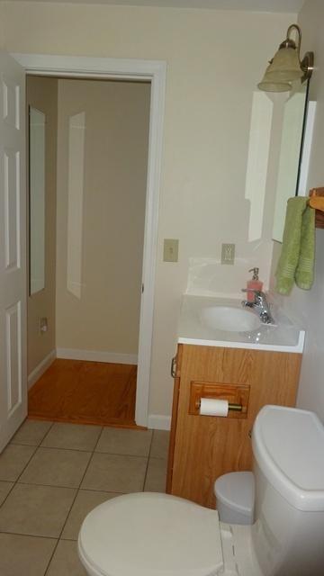 27 Hideaway Road, Unit G Buzzards Bay, MA 02532 - Photo 23 of 34 a bathroom with a sink a toilet and shower