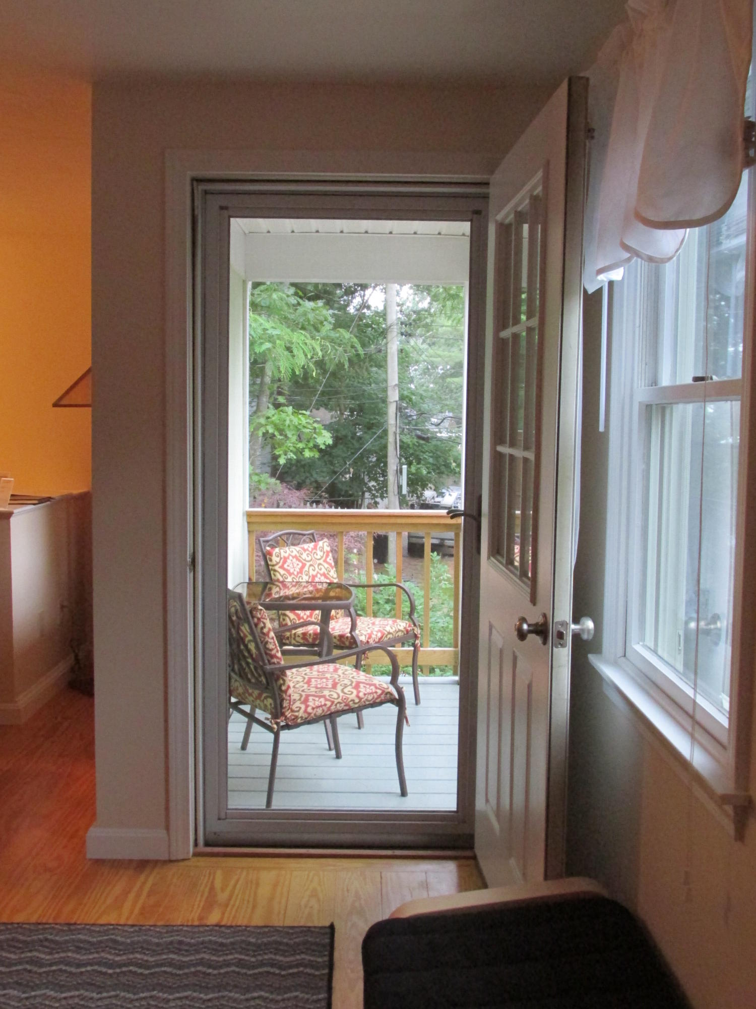 27 Hideaway Road, Unit G Buzzards Bay, MA 02532 - Photo 4 of 34 a view of a room with a window and wooden floor