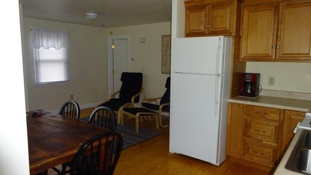27 Hideaway Road, Unit G Buzzards Bay, MA 02532 - Photo 9 of 34 a view of a kitchen with sink and refrigerator