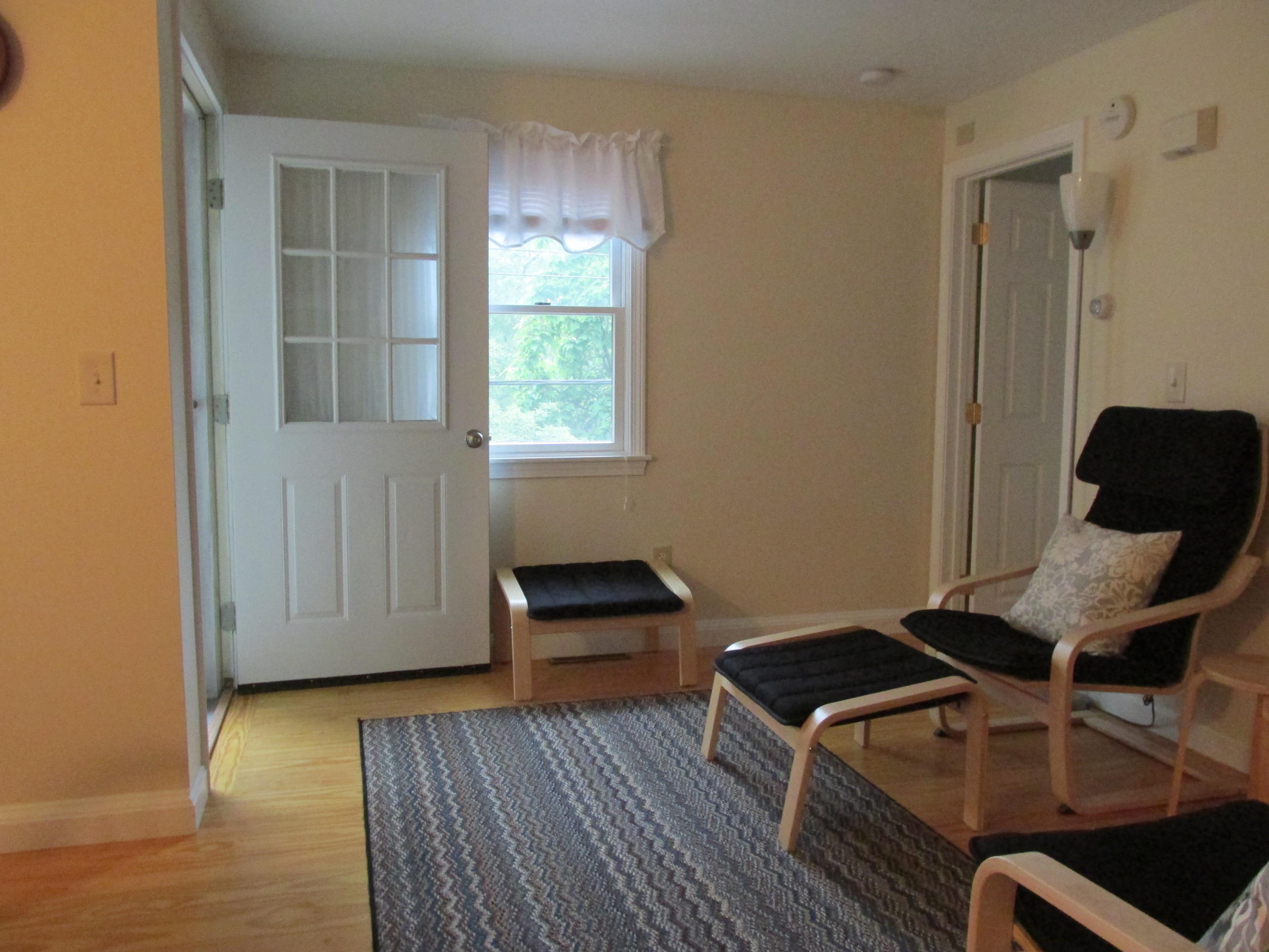 27 Hideaway Road, Unit G Buzzards Bay, MA 02532 - Photo 10 of 34 a living room with furniture and a window