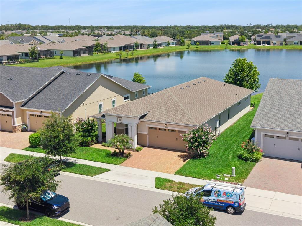 2665 Meadowedge Loop St. Cloud, FL 34772 - Photo 43 of 53 an aerial view of a house with outdoor space and lake view