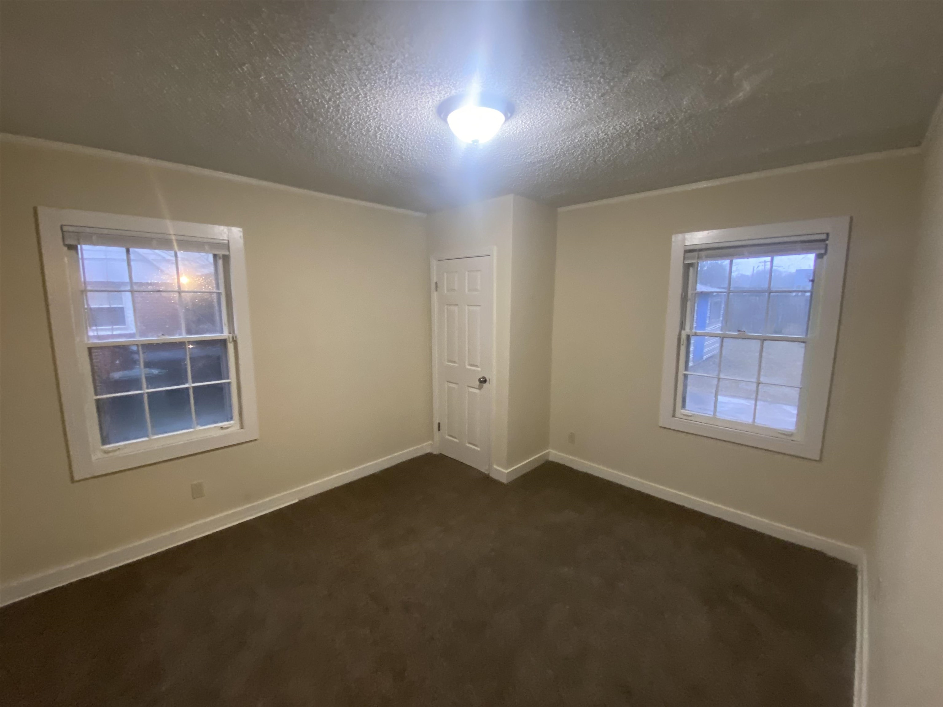 3632 Carrington Road Memphis, TN 38111 - Photo 3 of 8 an empty room with a window