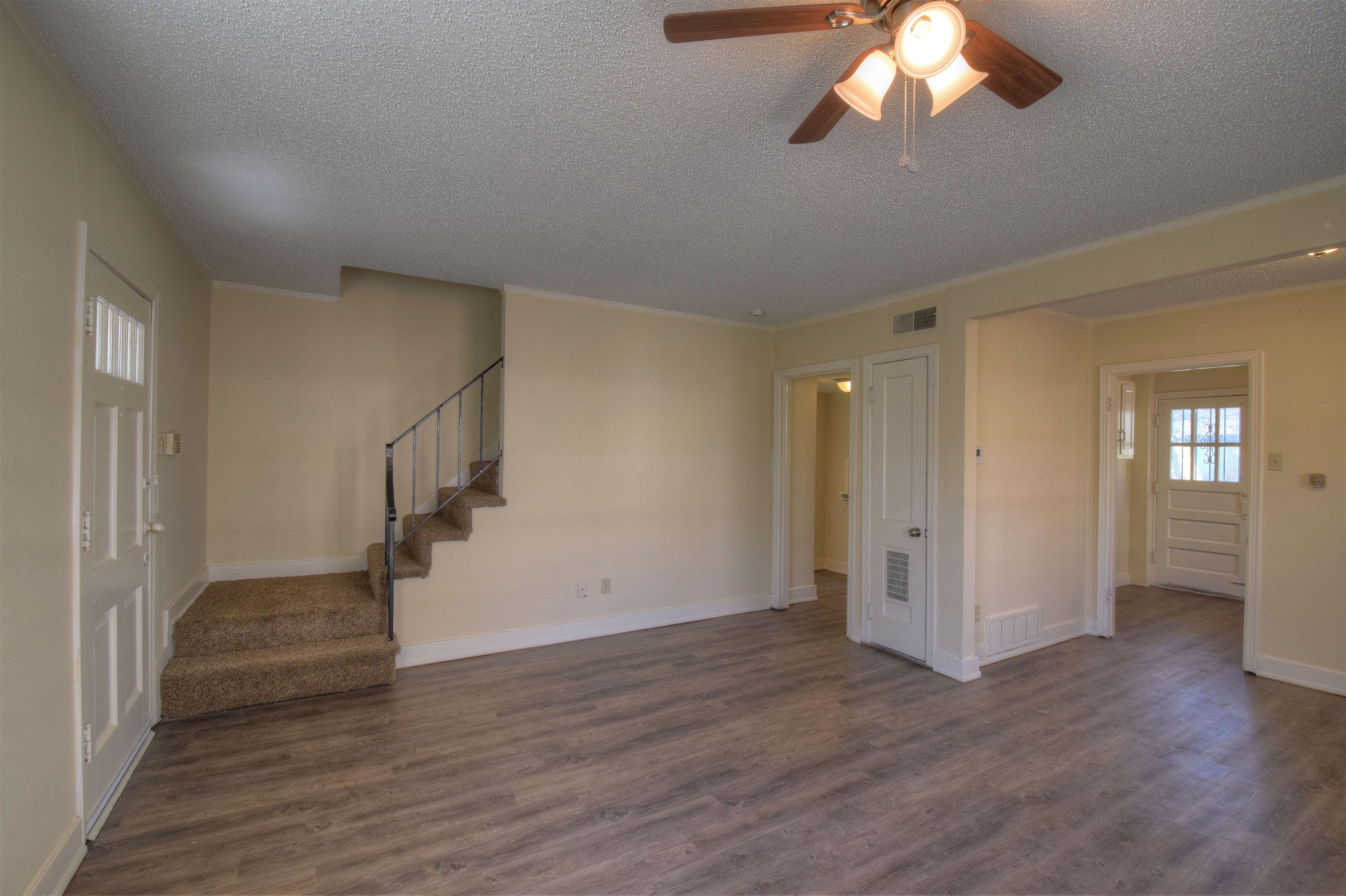 3632 Carrington Road Memphis, TN 38111 - Photo 8 of 8 a view of empty room with wooden floor