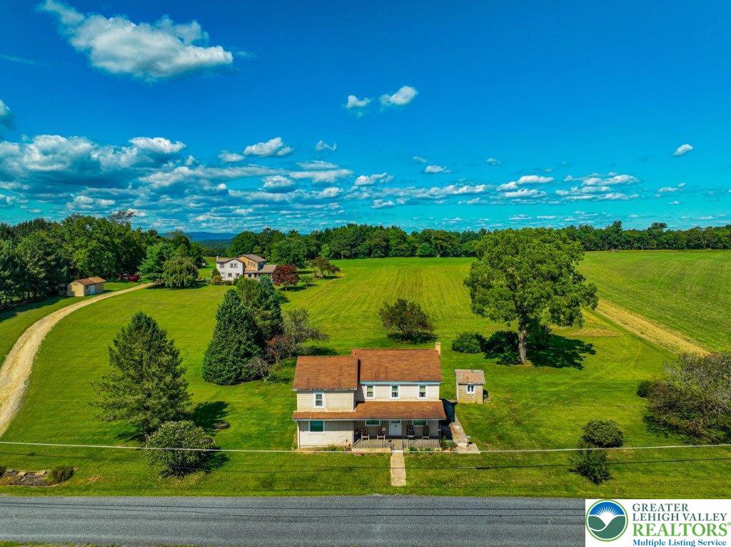 a view of a lake with a big yard