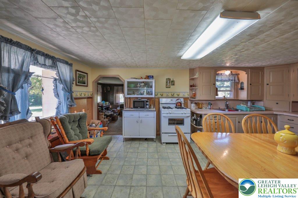 2485 Summer Mountain Road Palmerton, PA 18071 - Photo 11 of 38 a living room with furniture and a large window