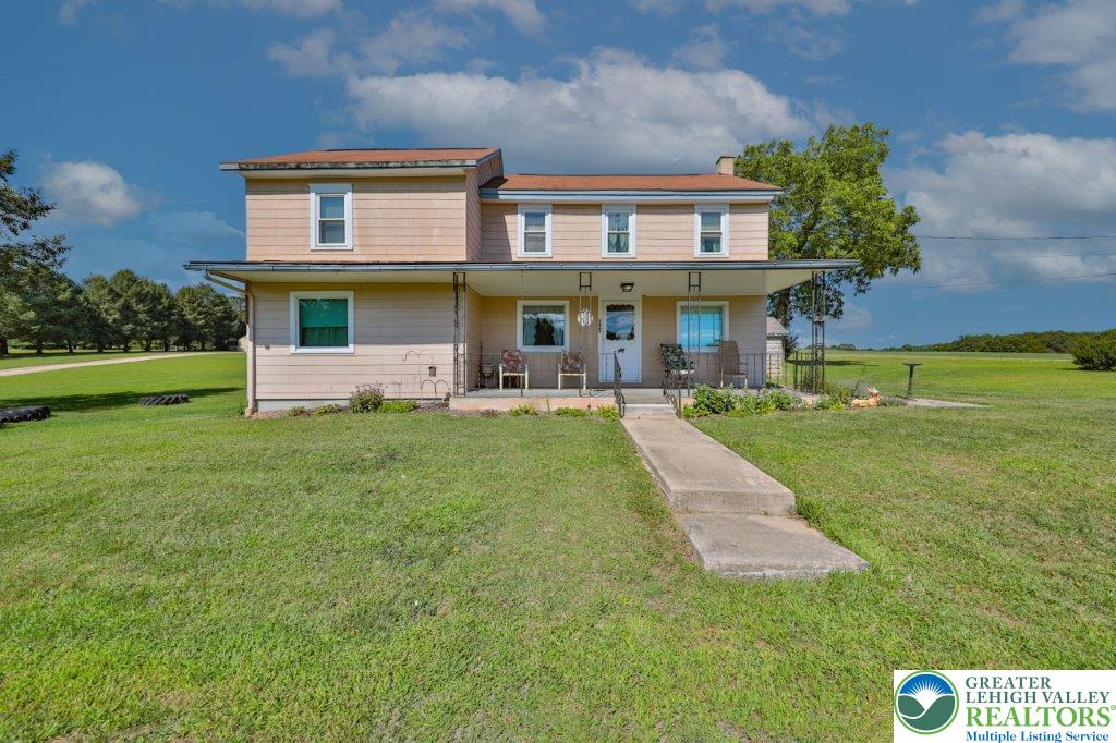 2485 Summer Mountain Road Palmerton, PA 18071 - Photo 2 of 38 a front view of a house with garden