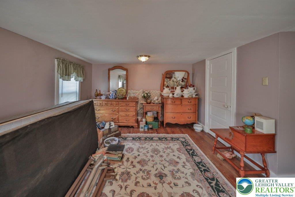 2485 Summer Mountain Road Palmerton, PA 18071 - Photo 25 of 38 a living room with furniture and wooden floor