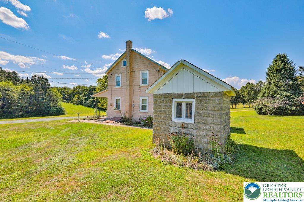 2485 Summer Mountain Road Palmerton, PA 18071 - Photo 29 of 38 a view of a house with pool and yard