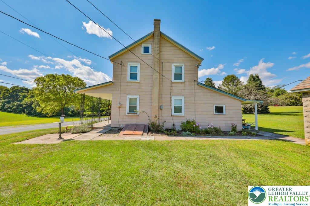 2485 Summer Mountain Road Palmerton, PA 18071 - Photo 32 of 38 a front view of house with garden