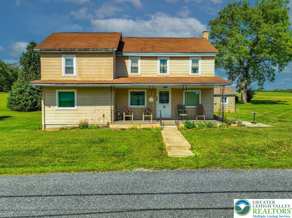 2485 Summer Mountain Road Palmerton, PA 18071 - Photo 5 of 38 a front view of a house with a yard