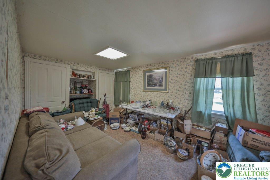 2485 Summer Mountain Road Palmerton, PA 18071 - Photo 10 of 38 a living room with furniture and a large window