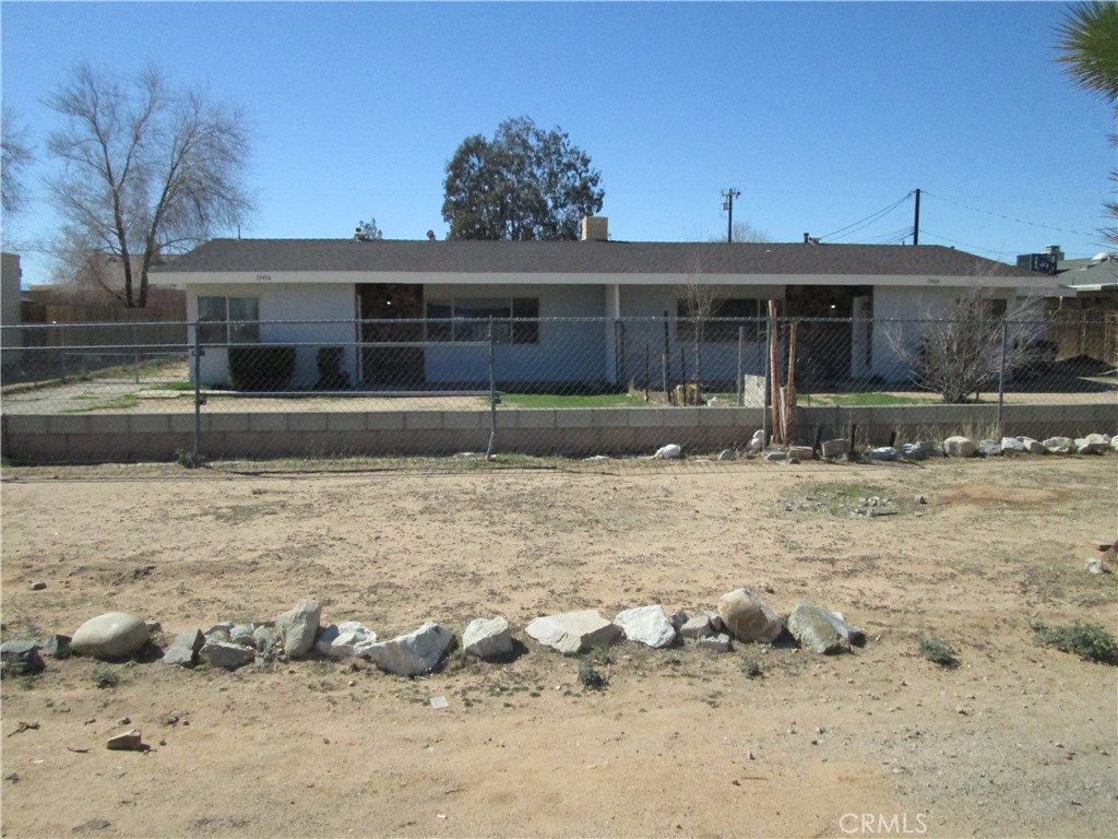 13464 Mohawk Road Apple Valley, CA 92308 - Photo 1 of 1 a front view of a house with a yard