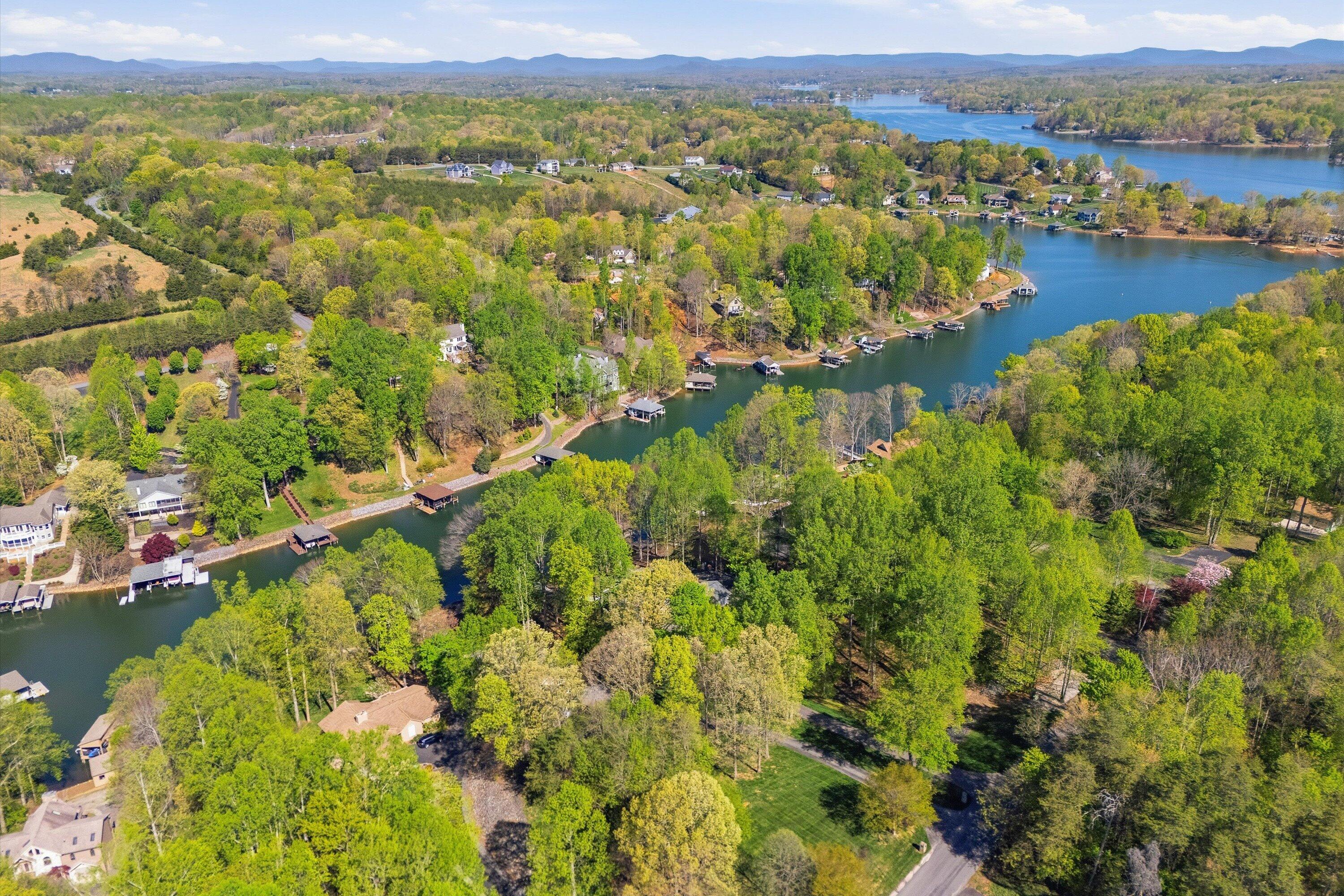 145 Channelview Drive Moneta, VA 24121 - Photo 3 of 62 view of a lake with mountains in the background