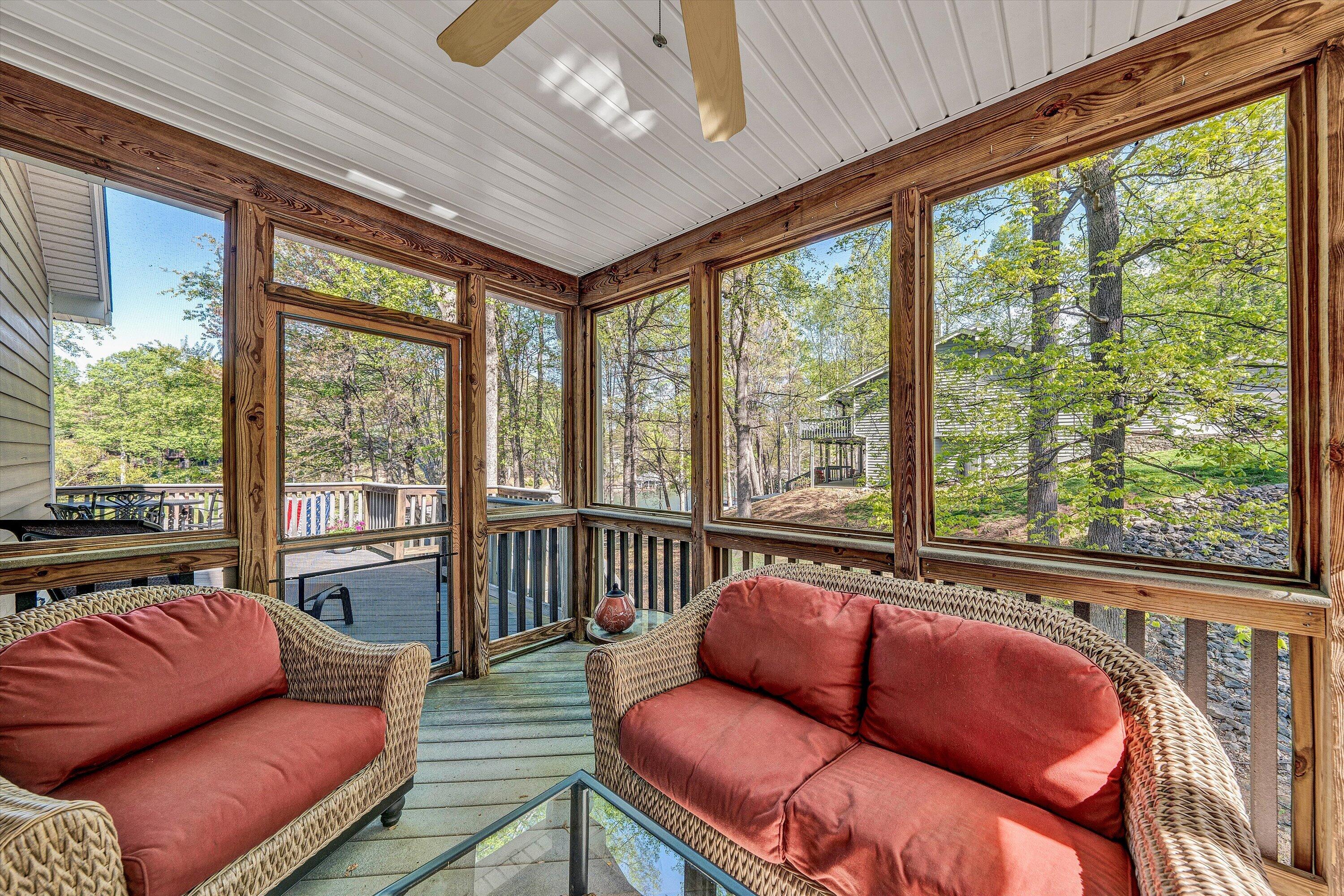 145 Channelview Drive Moneta, VA 24121 - Photo 38 of 62 a outdoor living space with furniture and a floor to ceiling window