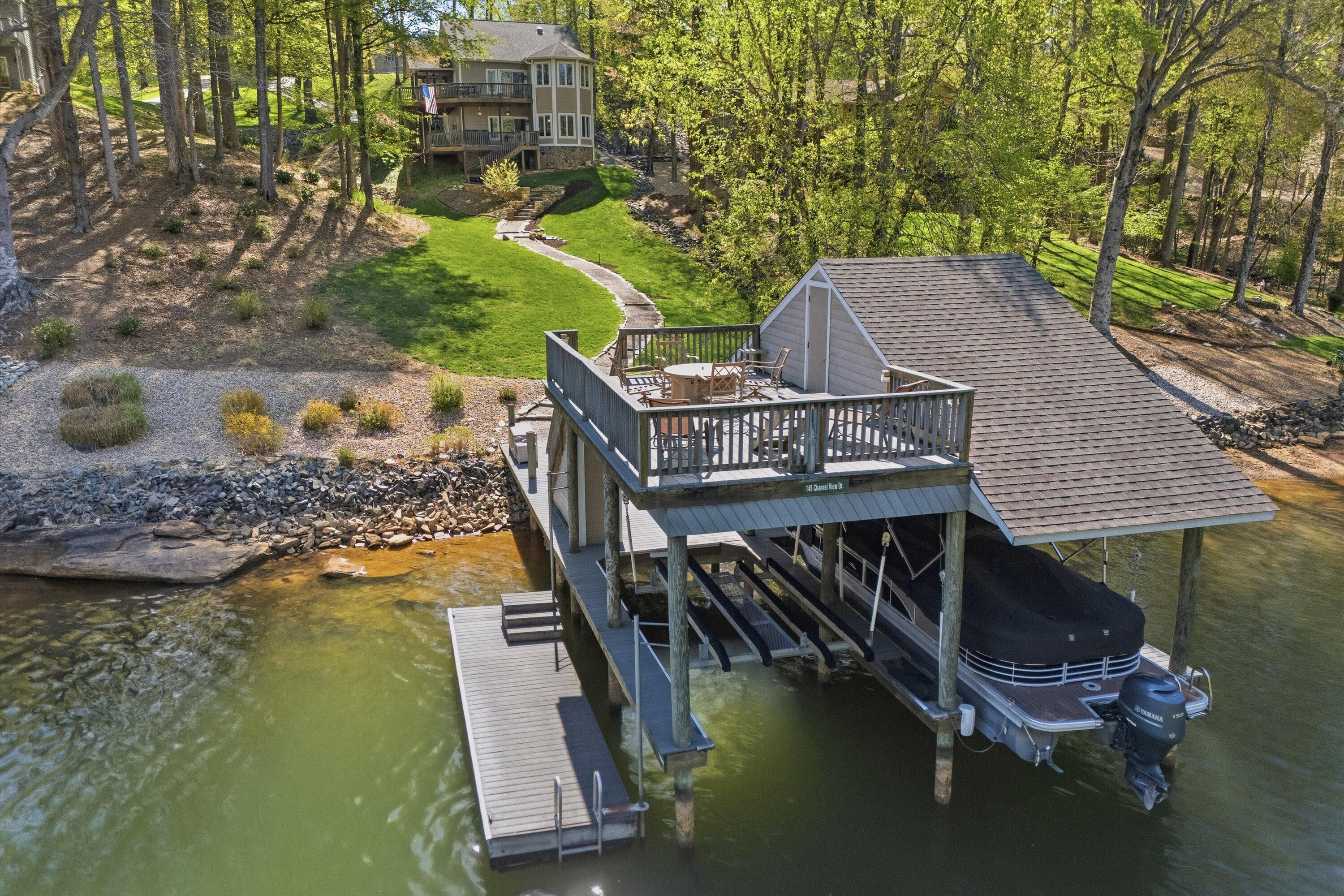 145 Channelview Drive Moneta, VA 24121 - Photo 4 of 62 an aerial view of house with yard swimming pool and outdoor seating