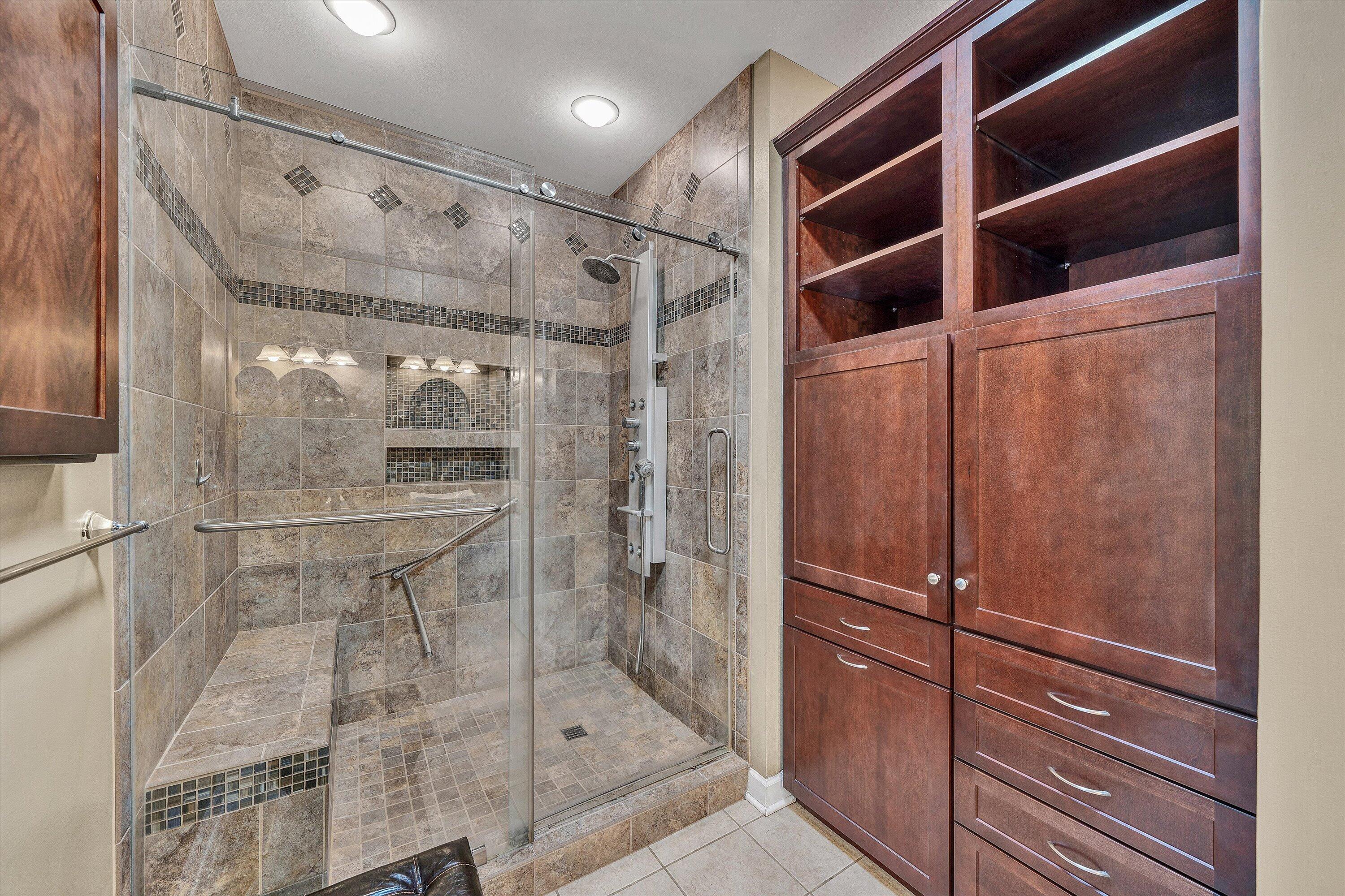 145 Channelview Drive Moneta, VA 24121 - Photo 45 of 62 a bathroom with a glass shower door