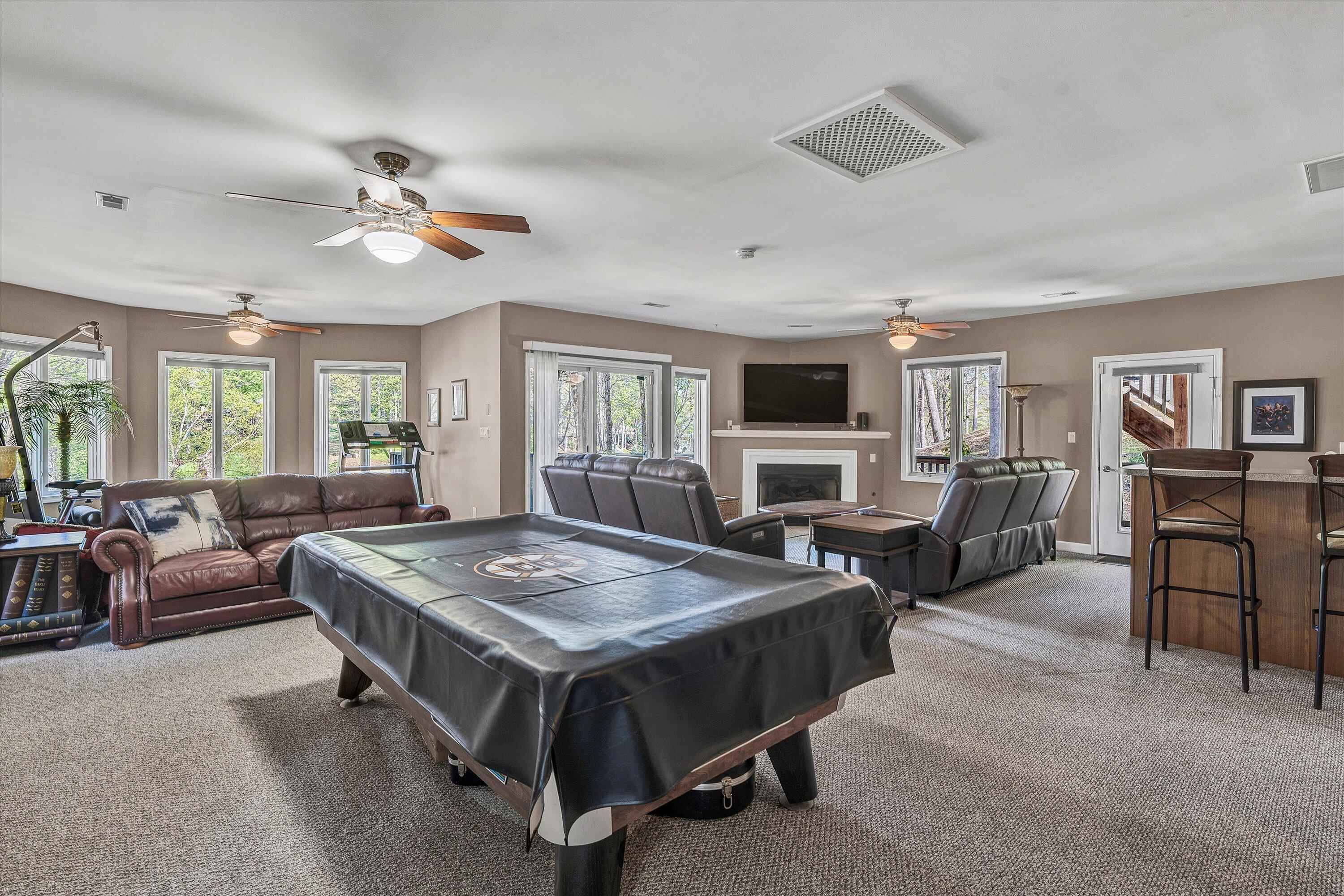 145 Channelview Drive Moneta, VA 24121 - Photo 46 of 62 a living room with furniture pool table and flat screen tv