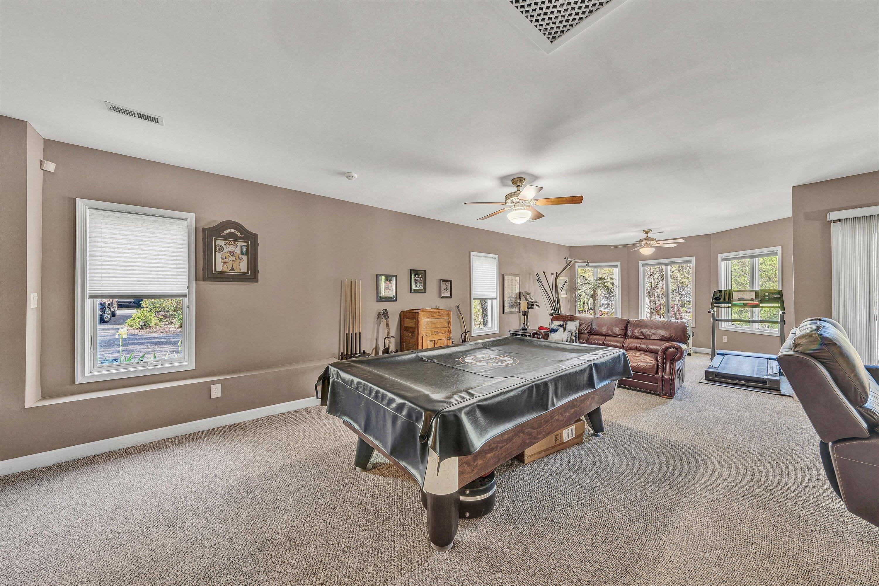 145 Channelview Drive Moneta, VA 24121 - Photo 47 of 62 a living room with furniture and a table
