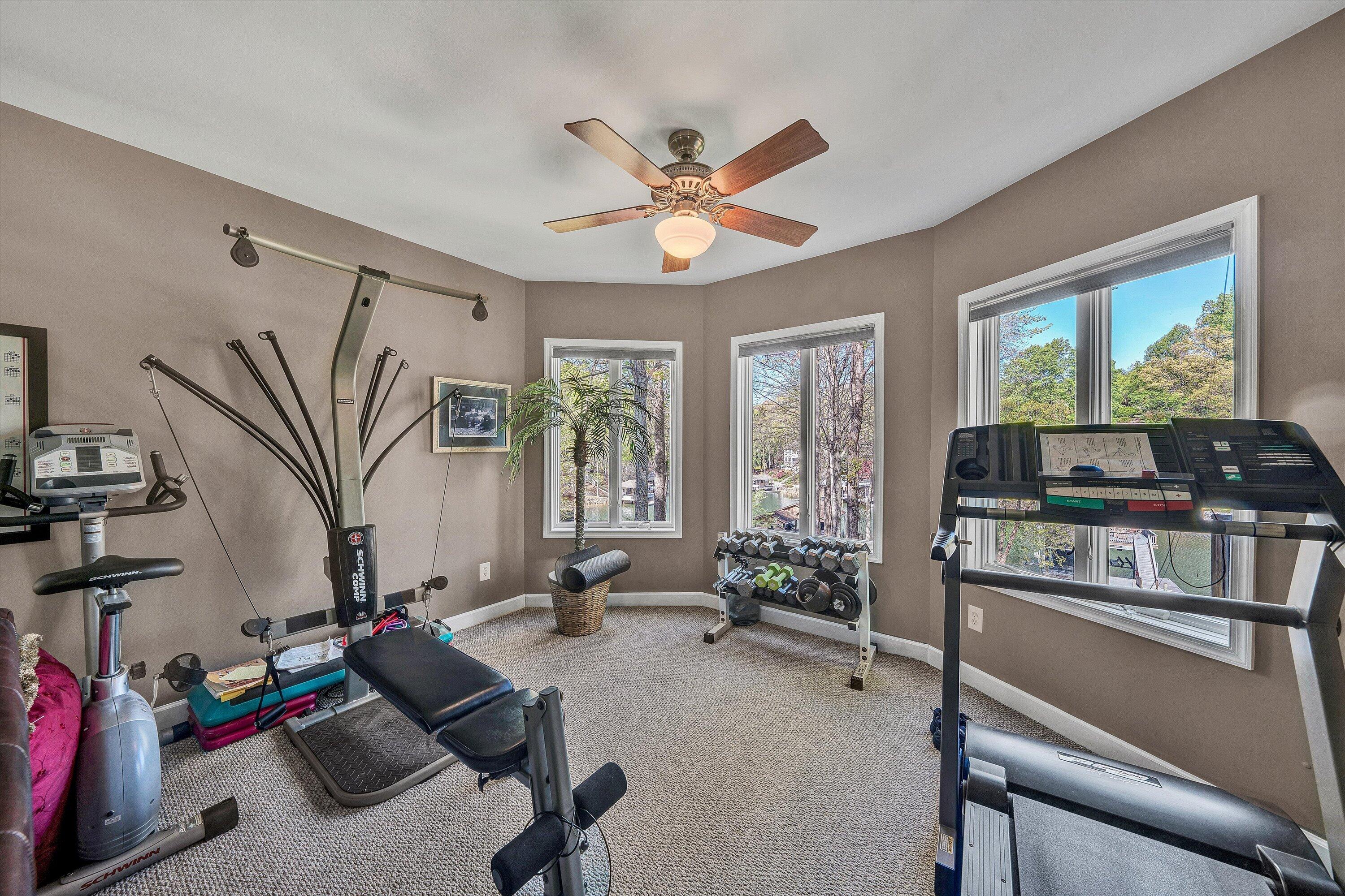145 Channelview Drive Moneta, VA 24121 - Photo 50 of 62 a living room with furniture and a flat screen tv