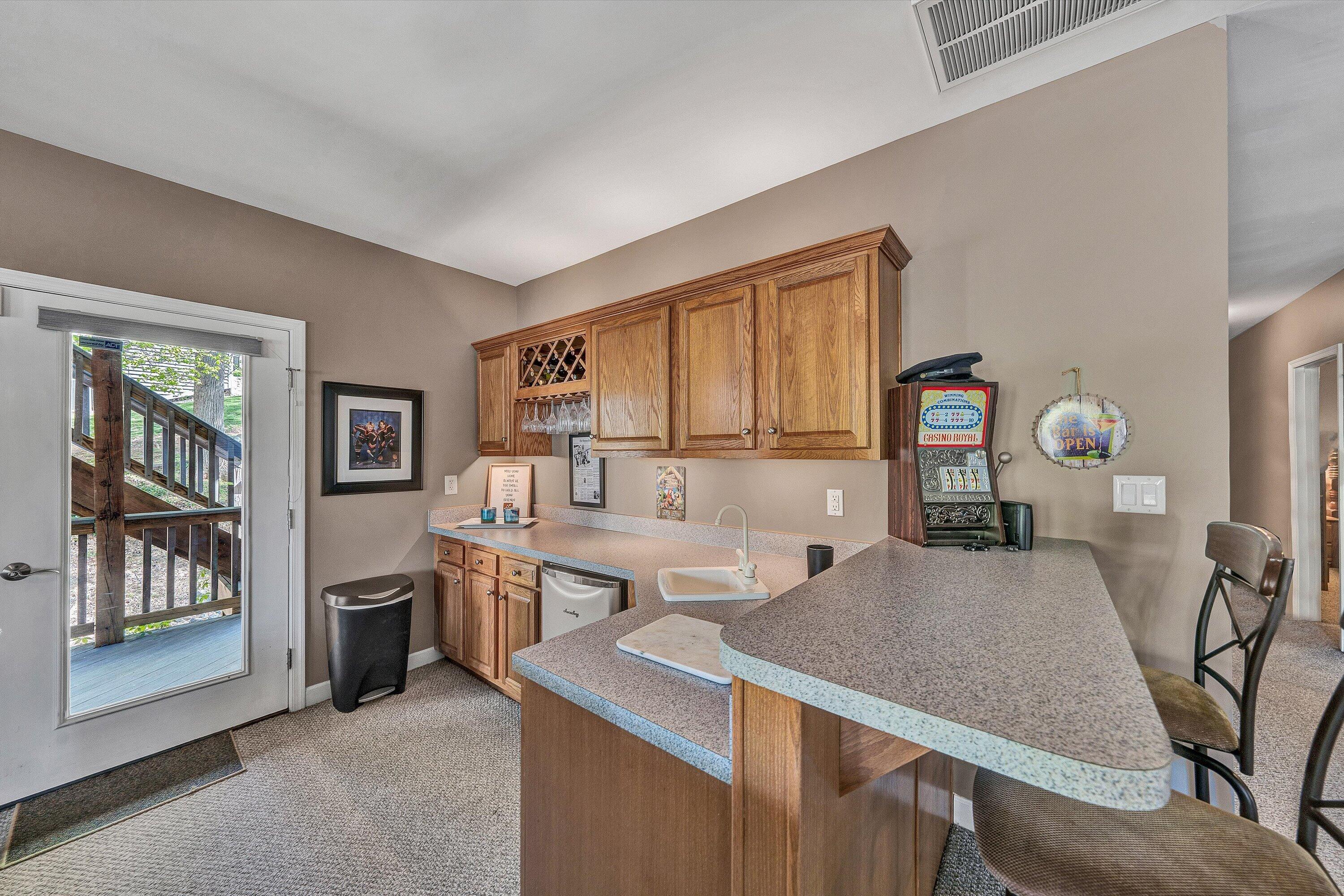 145 Channelview Drive Moneta, VA 24121 - Photo 52 of 62 a view of a kitchen area with furniture and window