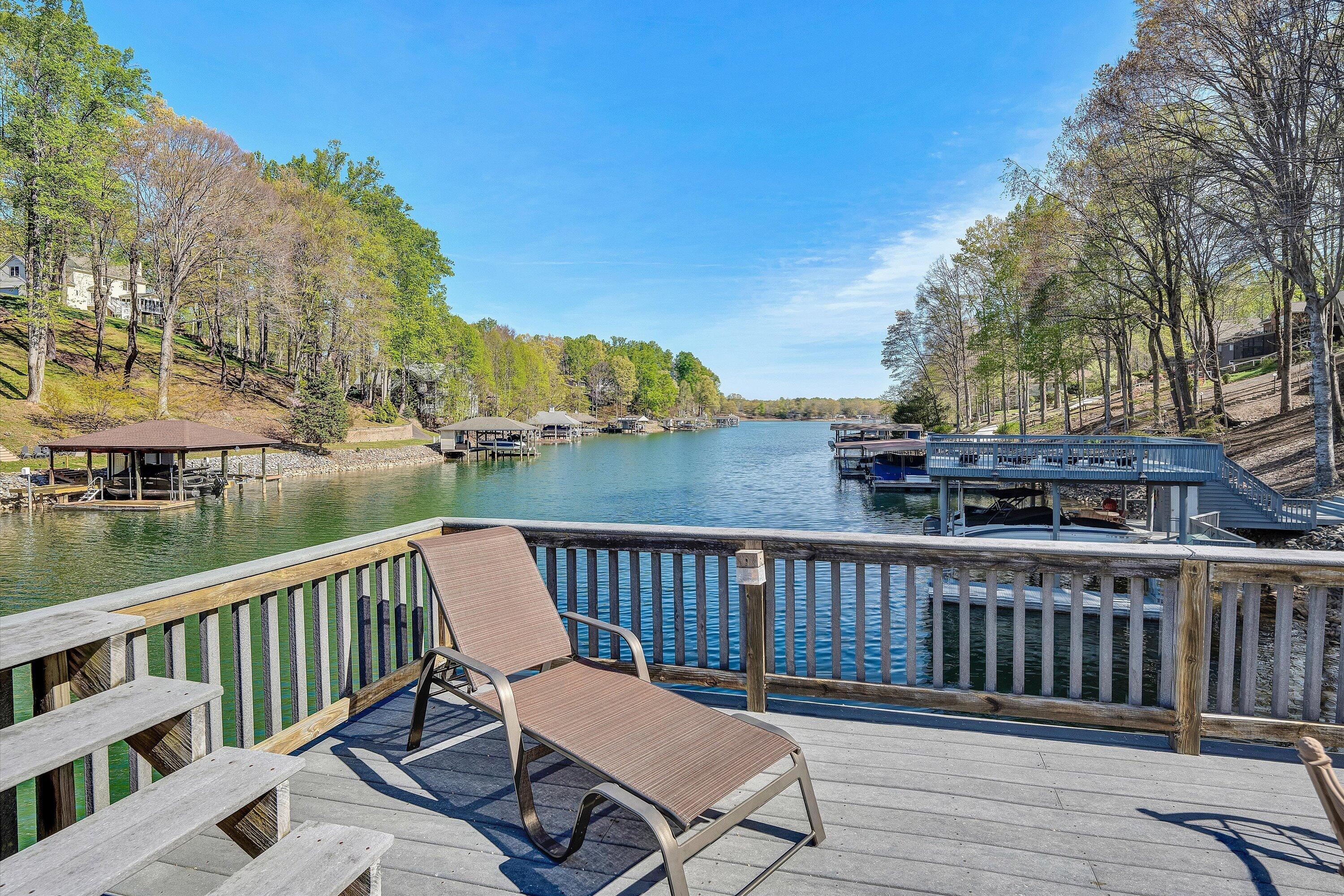 145 Channelview Drive Moneta, VA 24121 - Photo 9 of 62 a view of a chairs on a deck