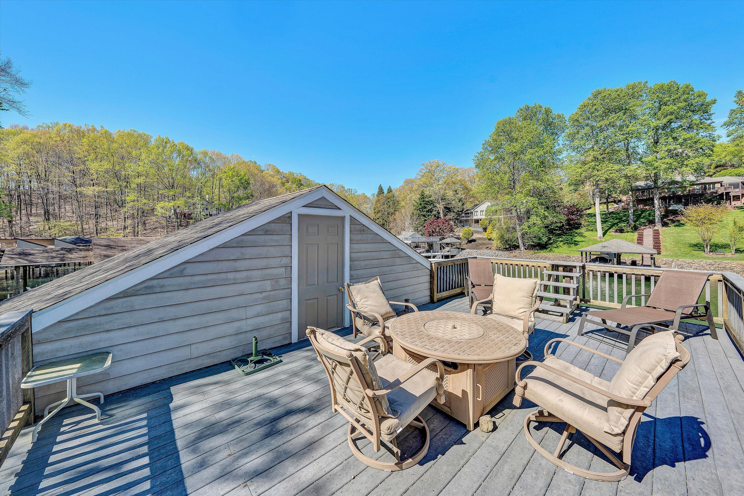 145 Channelview Drive Moneta, VA 24121 - Photo 10 of 62 a view of a patio on the roof deck