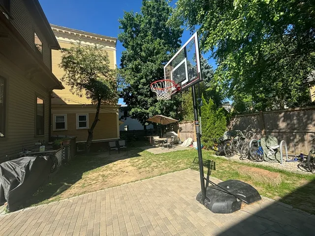 a house with trees in the background