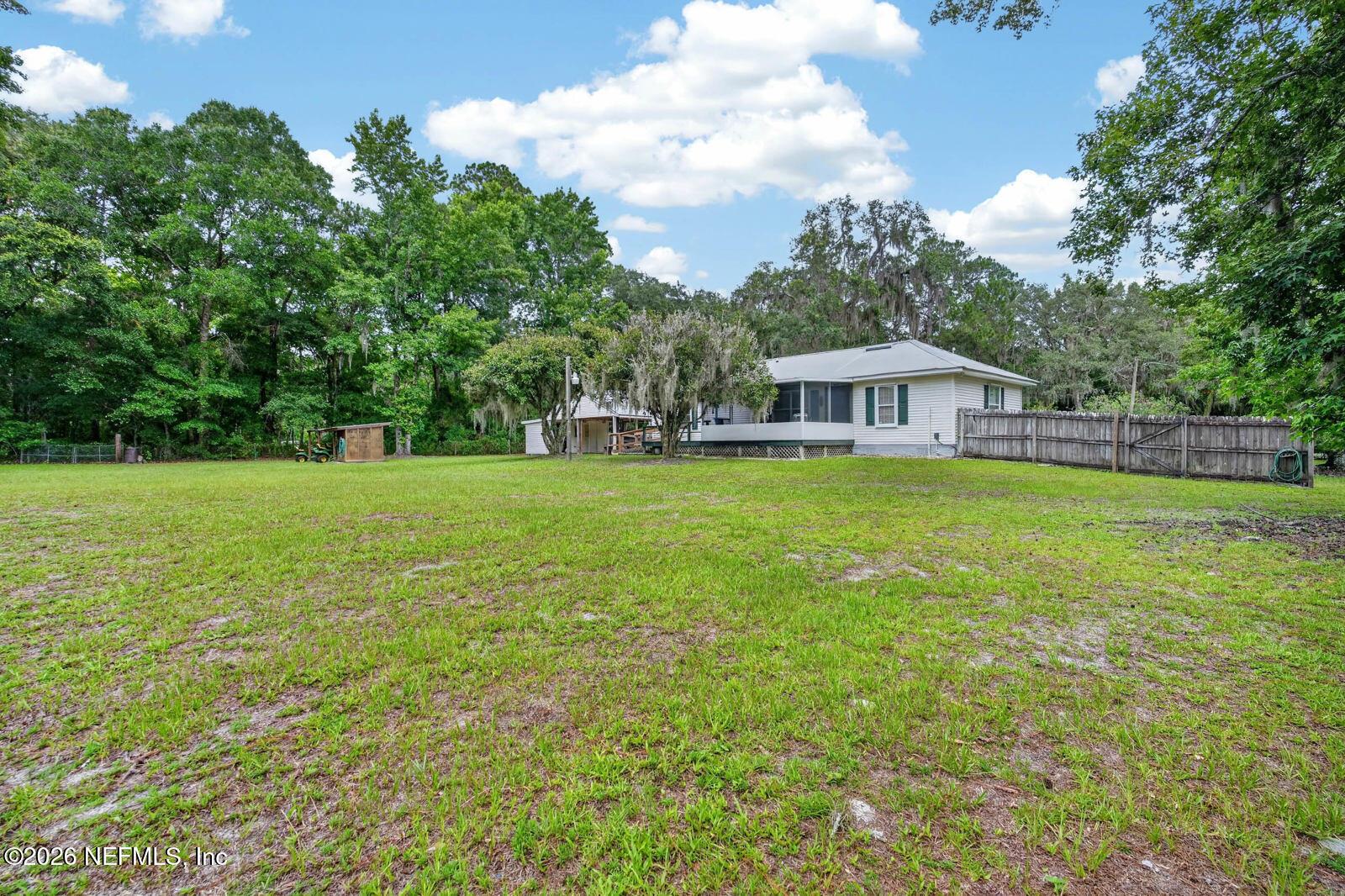 1950 Lightsey Road St. Augustine, FL 32084 - Photo 36 of 57 a view of a house with a yard