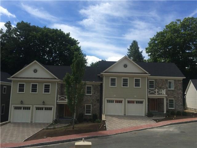 500 Main Street, Unit 16 Ridgefield, CT 06877 - Photo 1 of 1 front view of a house with a garage