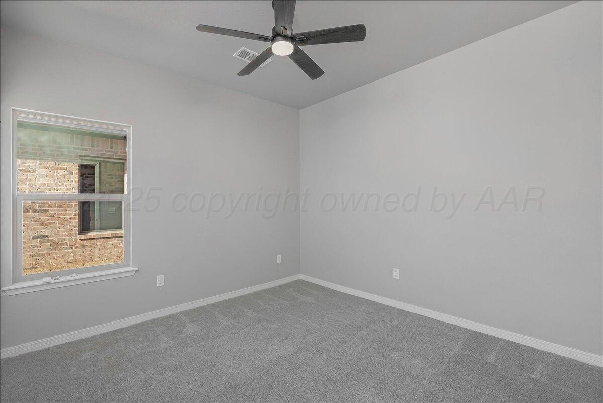 4206 Beacon Road Amarillo, TX 79118 - Photo 16 of 23 an empty room with a window
