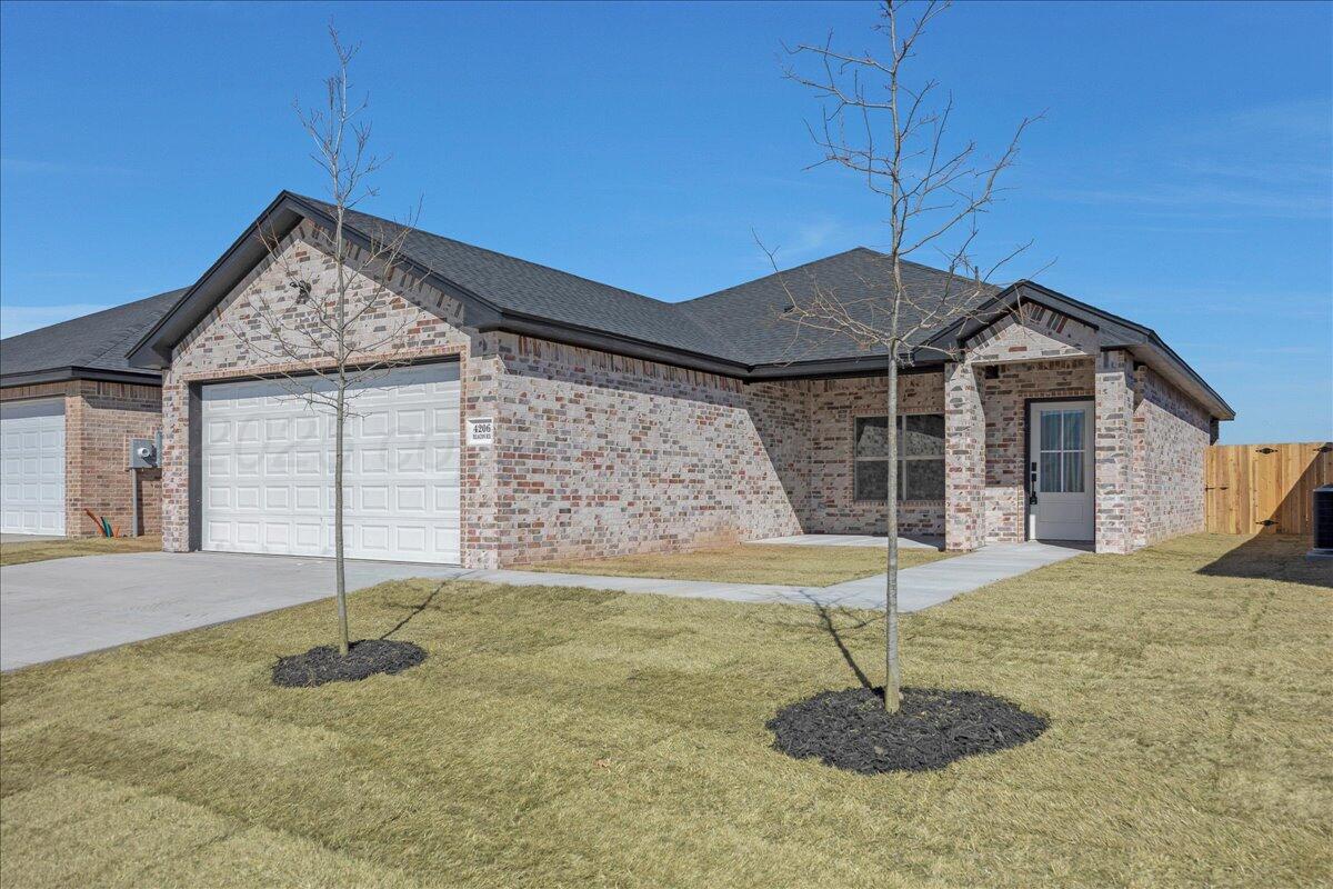 4206 Beacon Road Amarillo, TX 79118 - Photo 1 of 23 a backyard of a house
