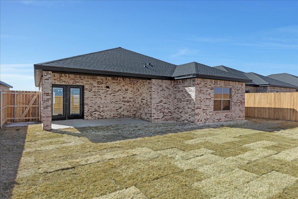 4206 Beacon Road Amarillo, TX 79118 - Photo 20 of 23 a front view of a house with a yard
