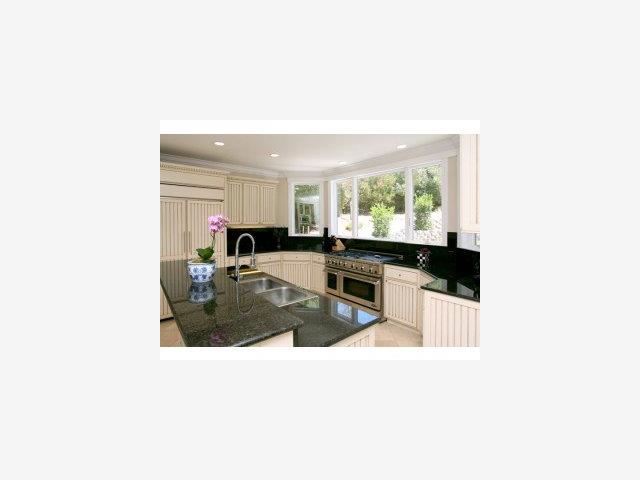 1821 Jarvis Road Santa Cruz, CA 95065 - Photo 4 of 9 a kitchen with a sink cabinets and a window