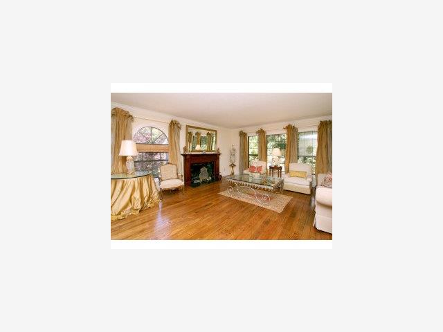 1821 Jarvis Road Santa Cruz, CA 95065 - Photo 7 of 9 a living room with a couch and a fireplace