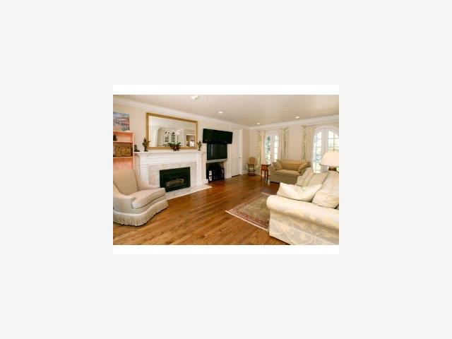 1821 Jarvis Road Santa Cruz, CA 95065 - Photo 8 of 9 a living room with furniture and a fireplace